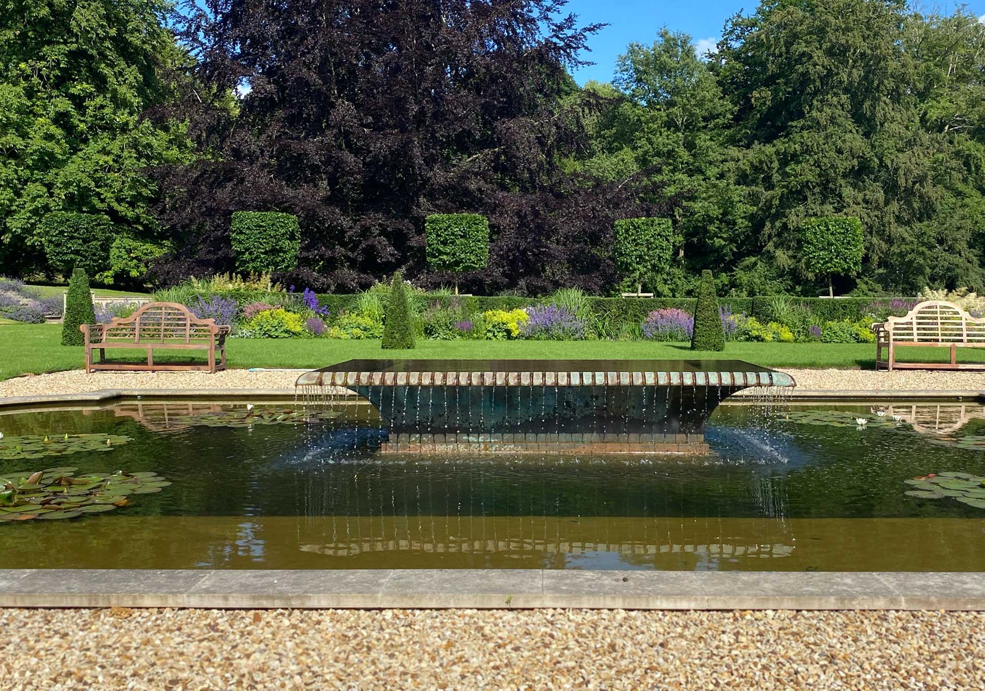 Lulworth water feature and pond side view in new formal garden at Exton Hall designed by Peter Eustance