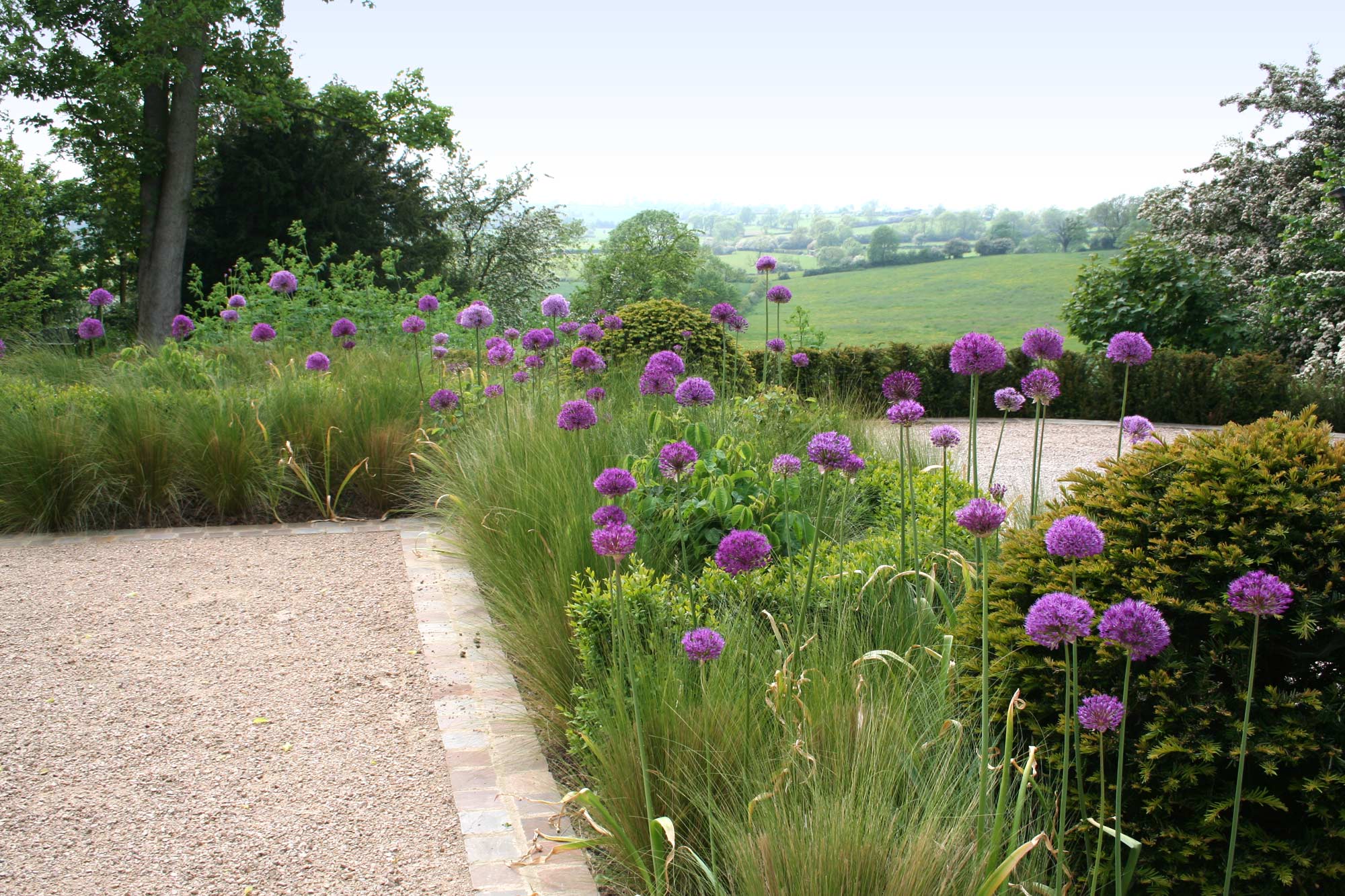 Completion of landscaping to Leicesteshire country house create an attractive connection between garden and landscape beyond.