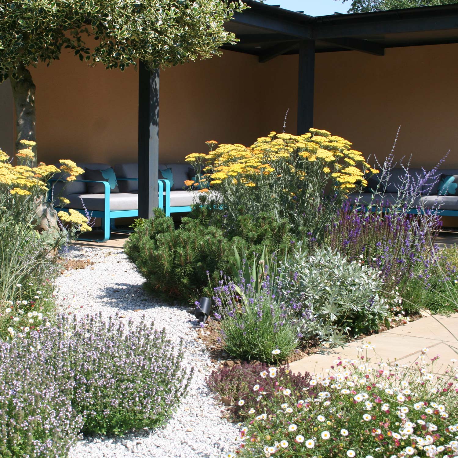 Jubilee Scree paths planting and arbour terrace of new family garden in Lincolnshire designed by Peter Eustance